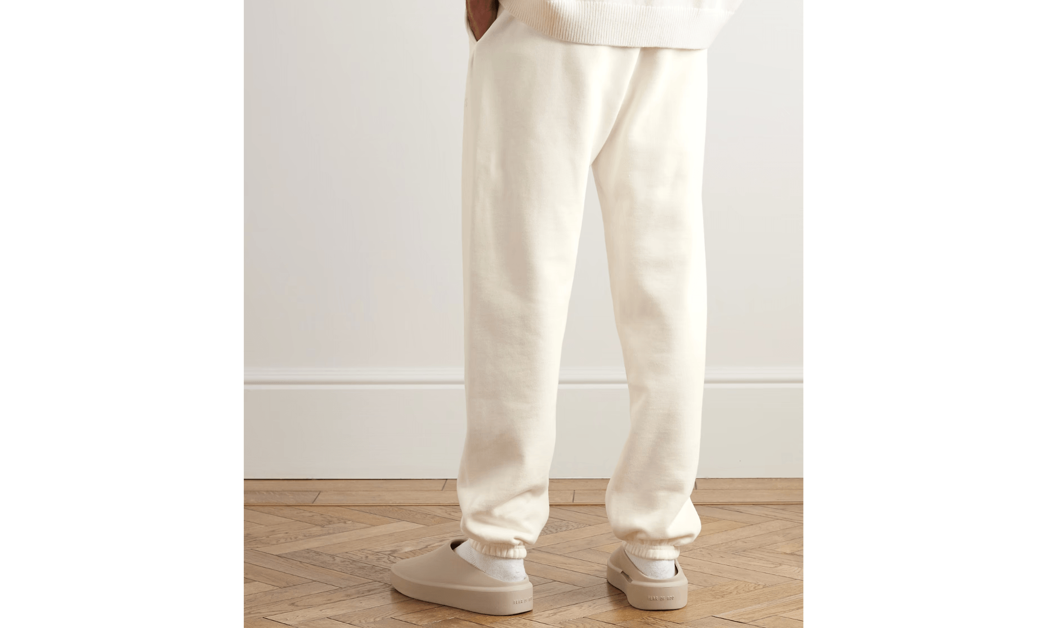 Tepláky Fear Of God Essentials Logo-Appliquéd Sweatpants White - SneakerDefinition