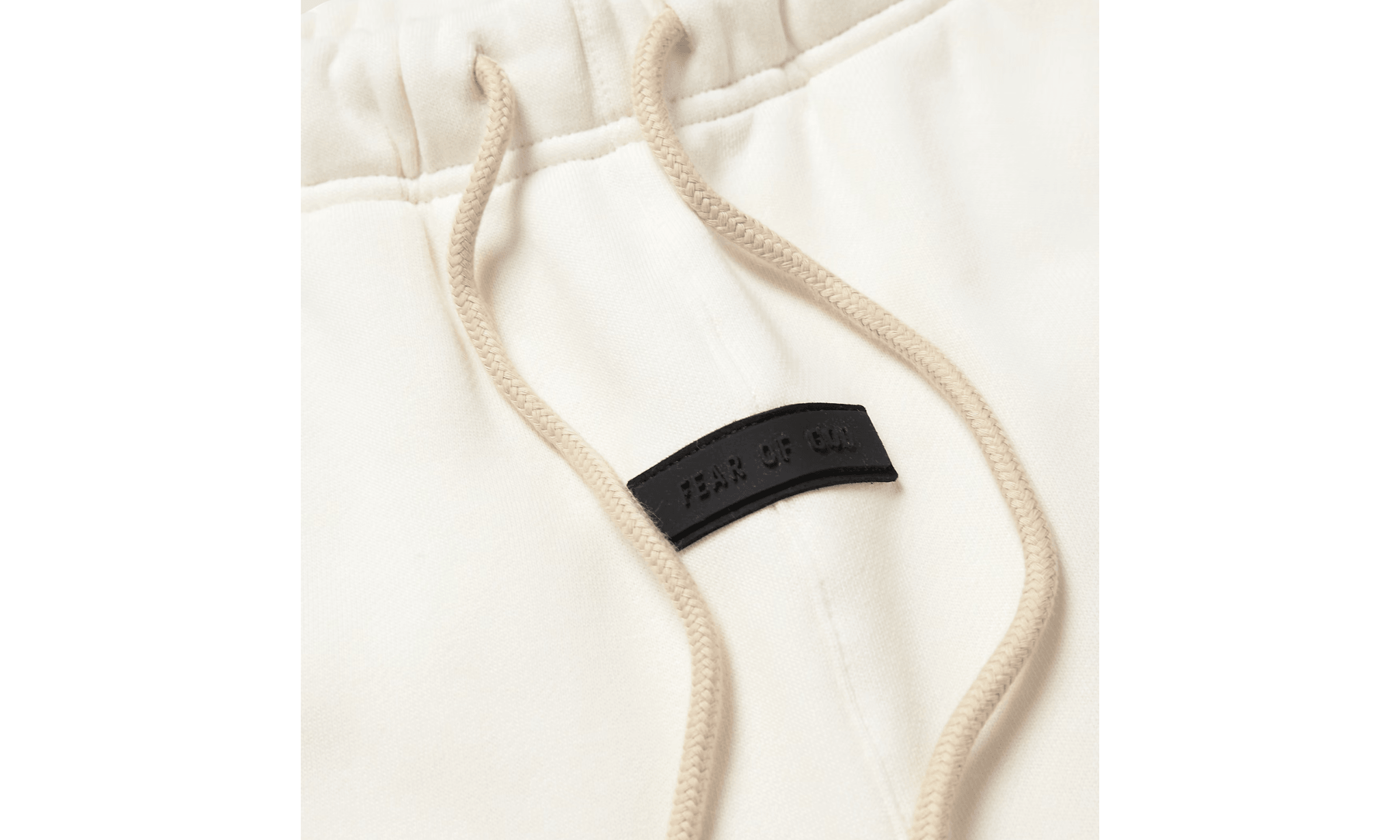 Tepláky Fear Of God Essentials Logo-Appliquéd Sweatpants White - SneakerDefinition